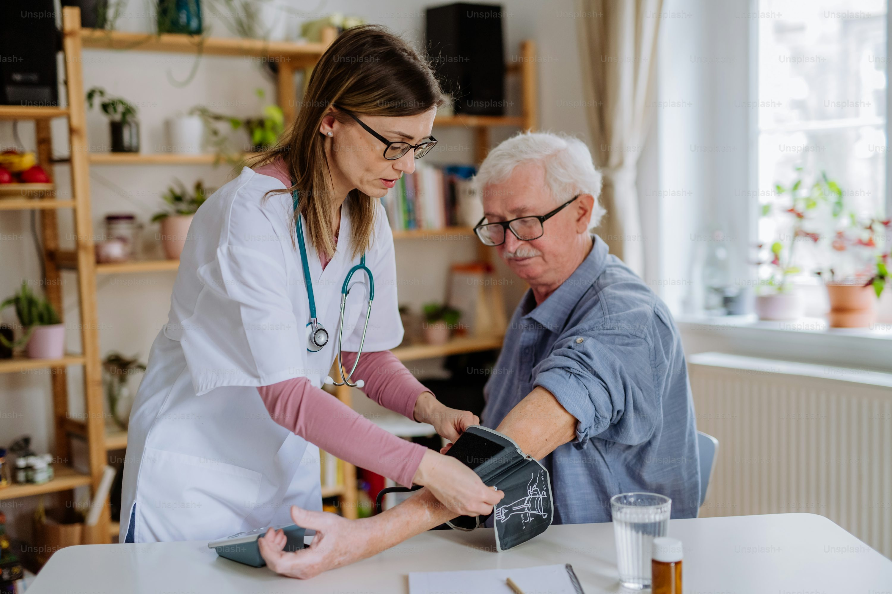 Nurse with elderly patient